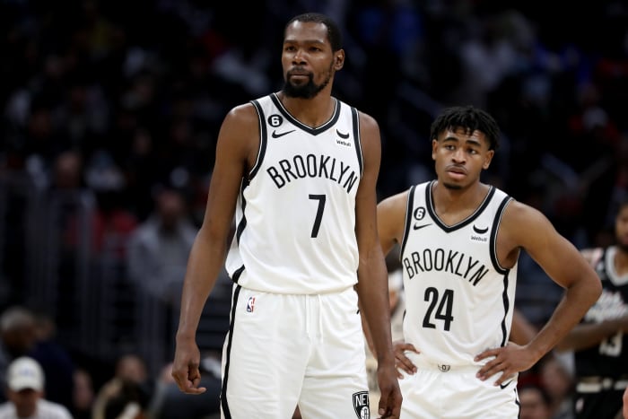 Brooklyn Nets forward Kevin Durant (7) and guard Cam Thomas (24)